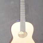 Spruce top with oval soundhole